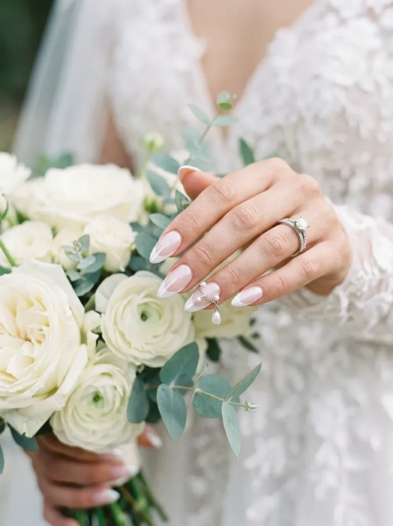 wedding nail ideas 2026 elegant white chrome nails with pearl charm