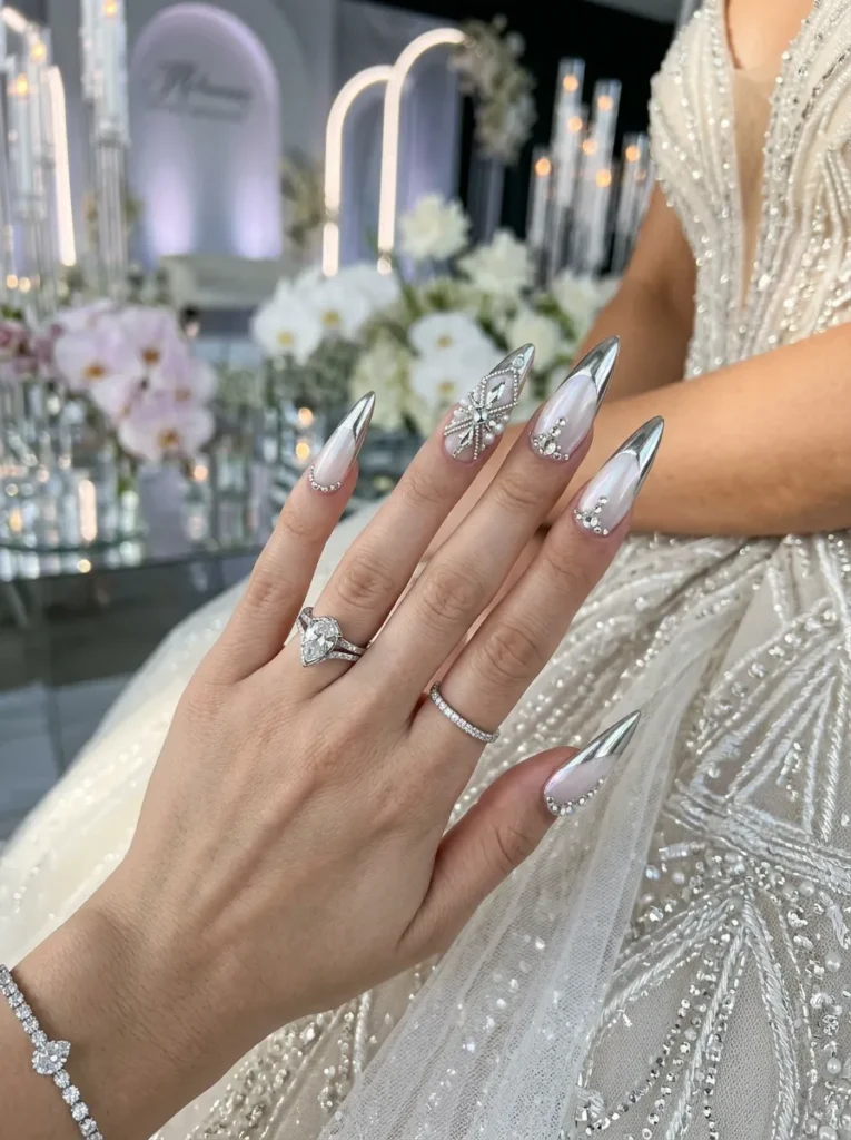 wedding nail ideas 2026 silver chrome french tips with crystal accents stiletto