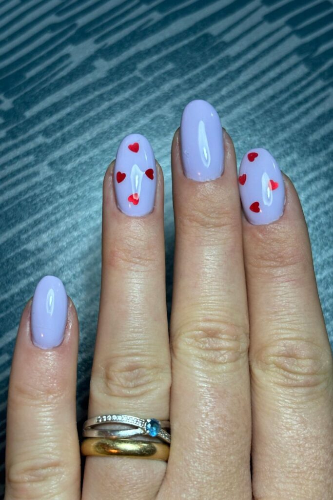 lavender aesthetic nail ideas with heart detail soft feminine nails