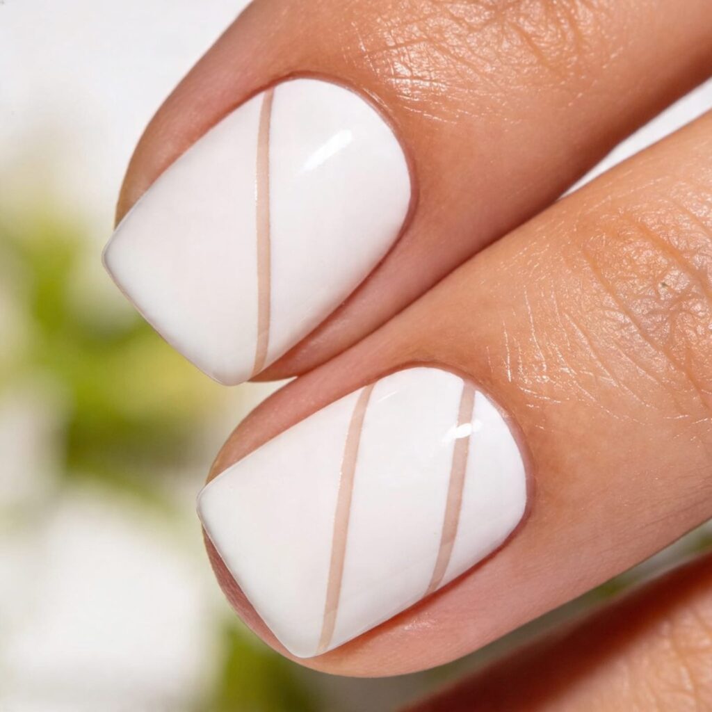 negative space stripe nails spring 2026 minimal linear nail art design