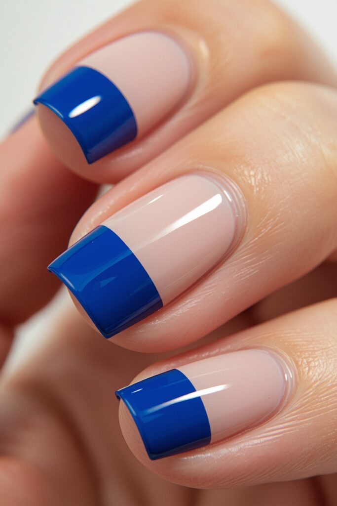 bold graphic French tip nails spring 2026 cobalt blue oversized tip