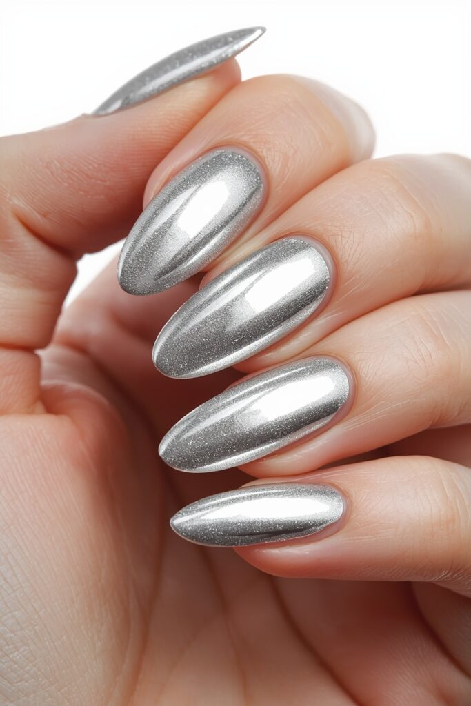 Silver chrome mirror prom nails on almond shape full coverage 2026