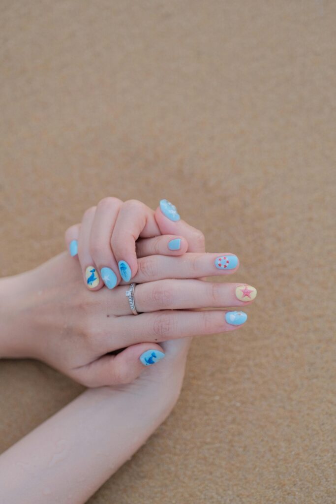 Colorful nail art design for nail biters that helps reduce nail biting habits