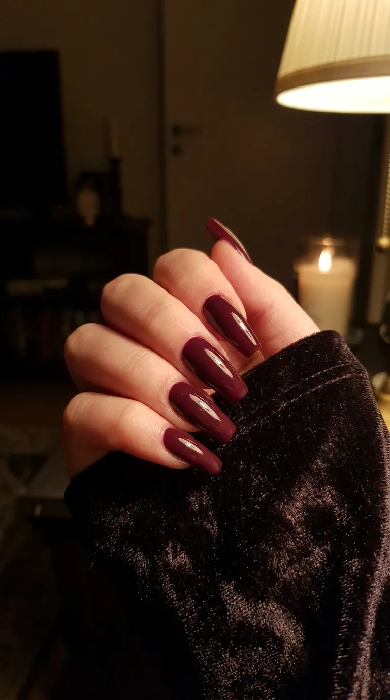 Coffin-shaped nails in deep burgundy