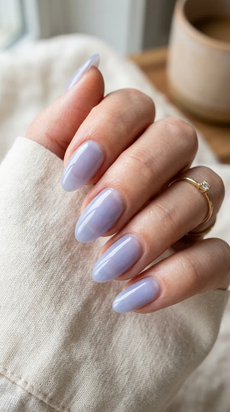 Milky periwinkle nails close-up