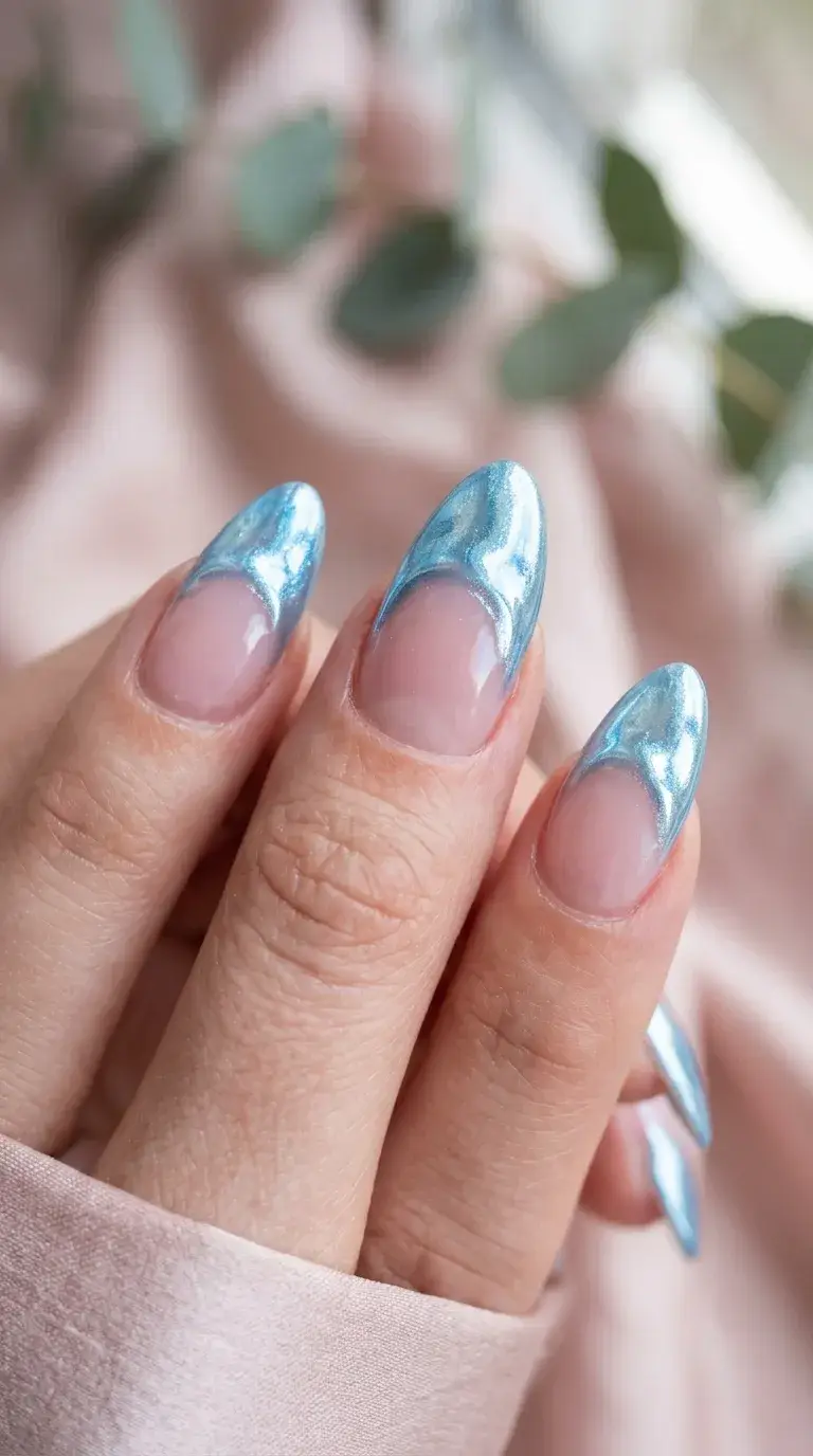 Pool-glazed icy blue chrome nails