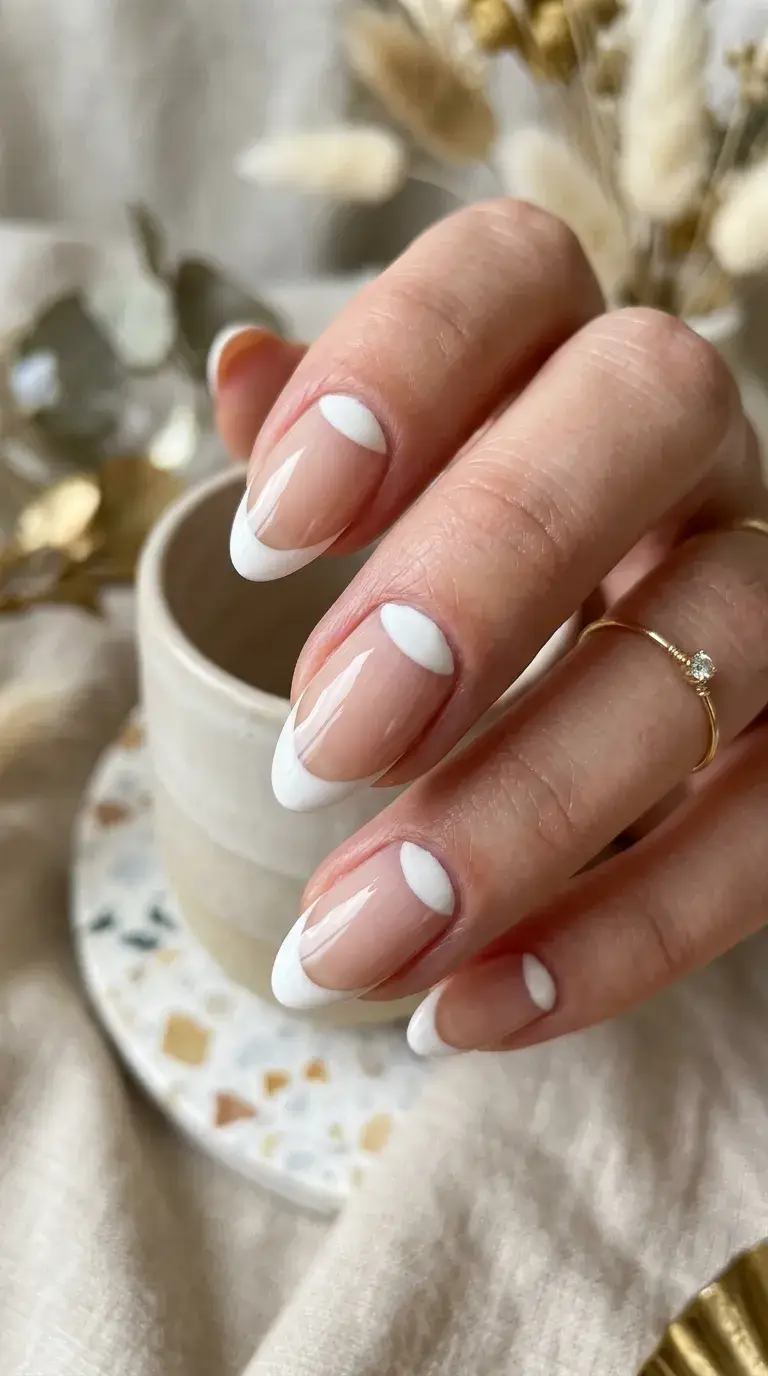 Reverse French manicure with negative space design