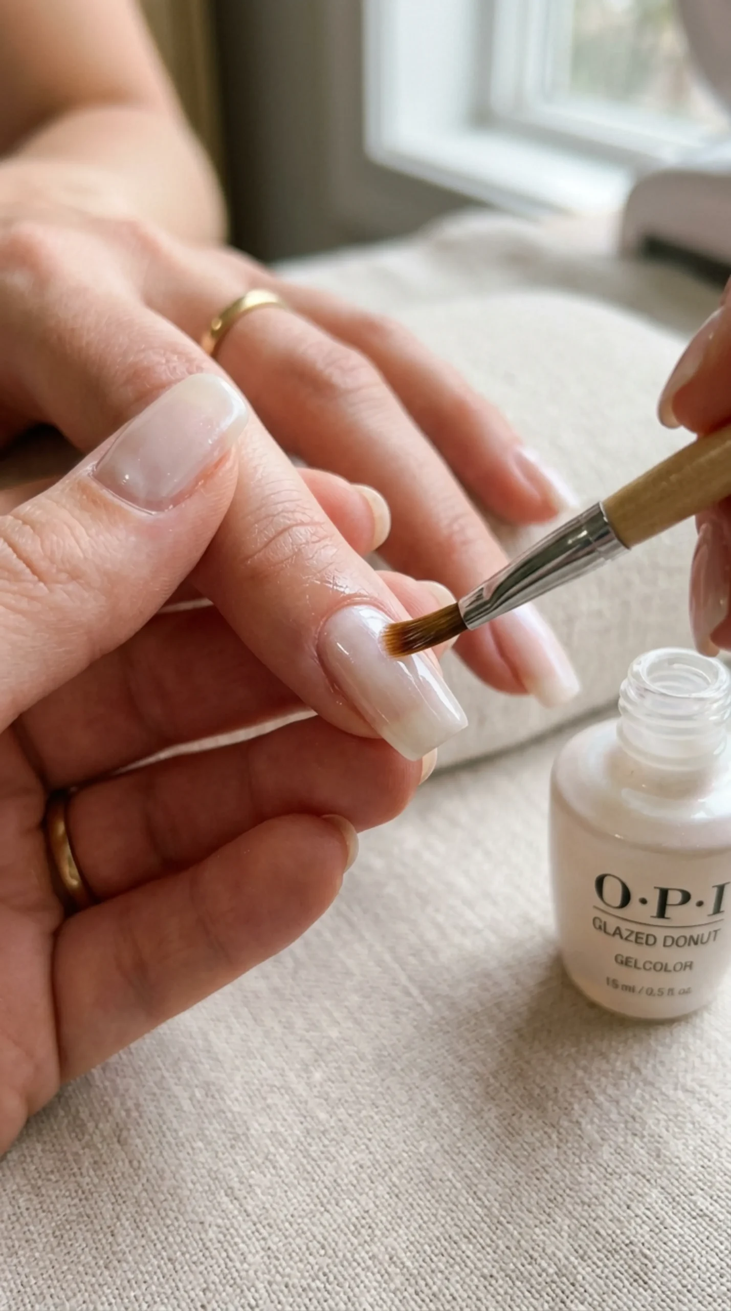 Polish coat being applied with a nail brush