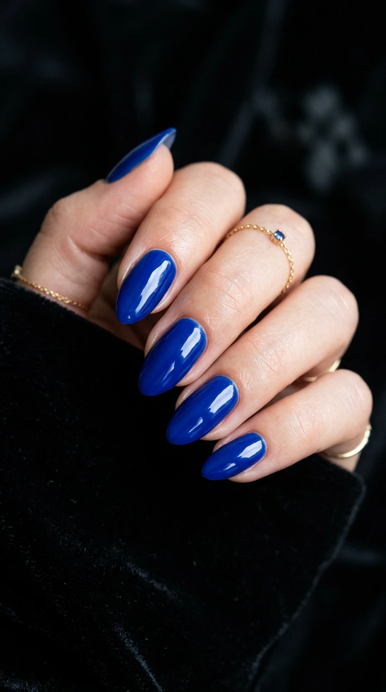 karol g nails - Sapphire blue glossy nails