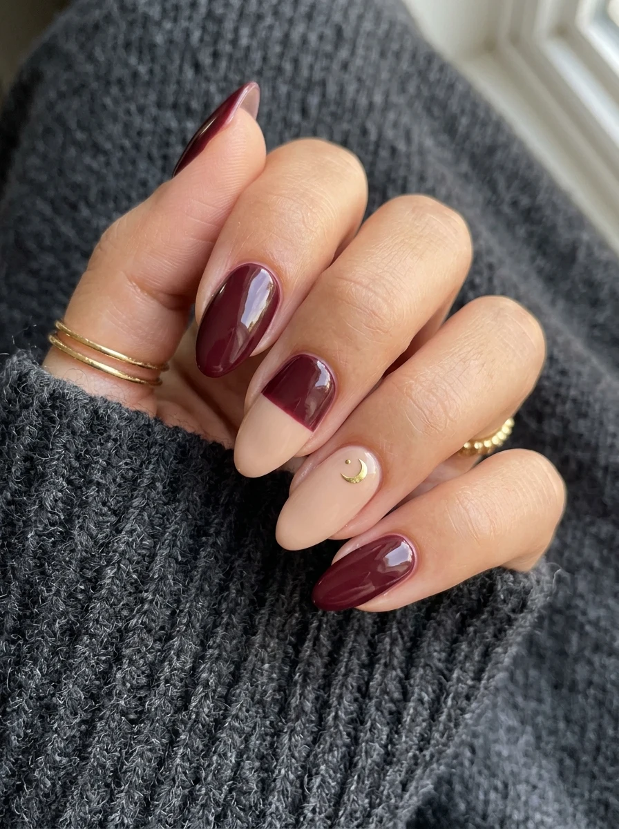 understated two tone halloween nail design in nude and burgundy