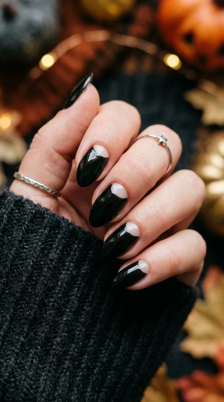 Simple Halloween Nails &ndash; negative space crescent moon design near the cuticle