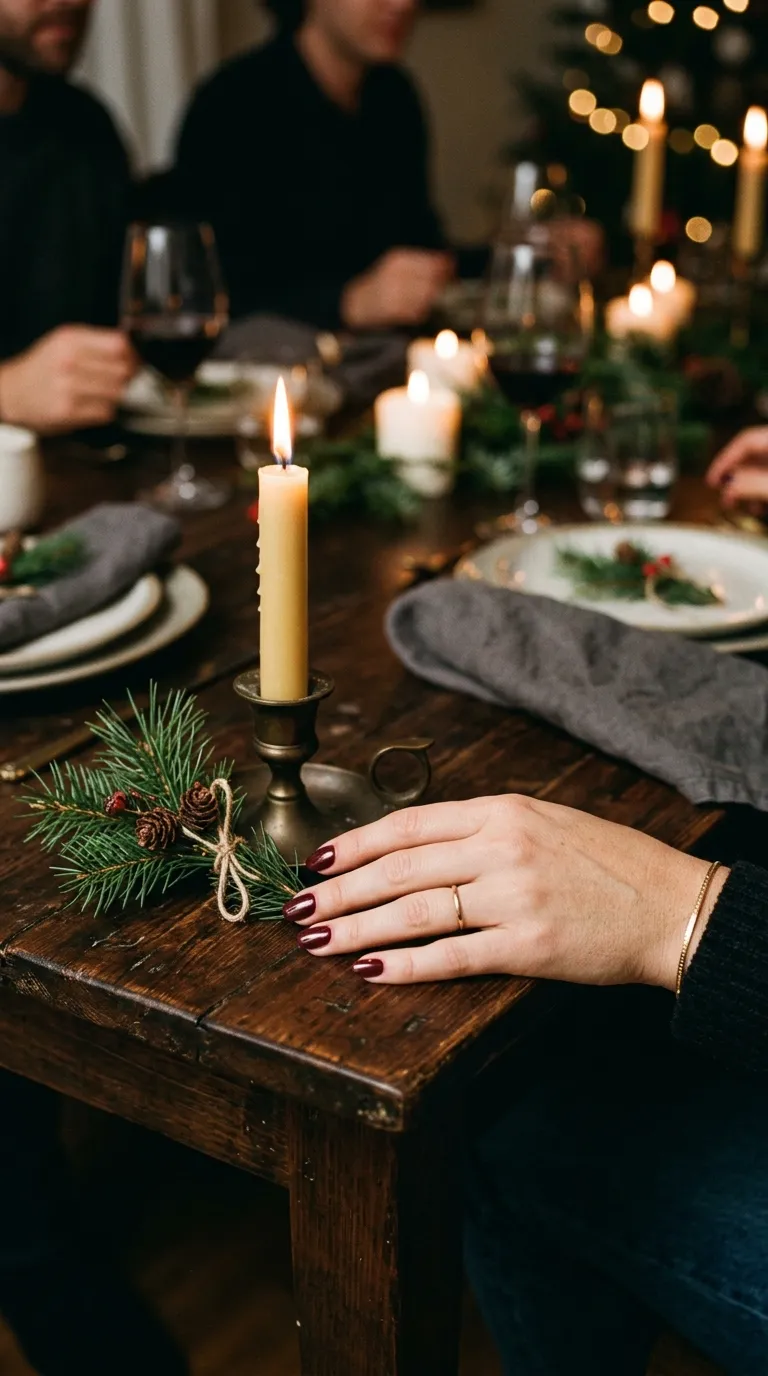 Burgundy Christmas manicure 2026 styled for an elegant holiday dinner