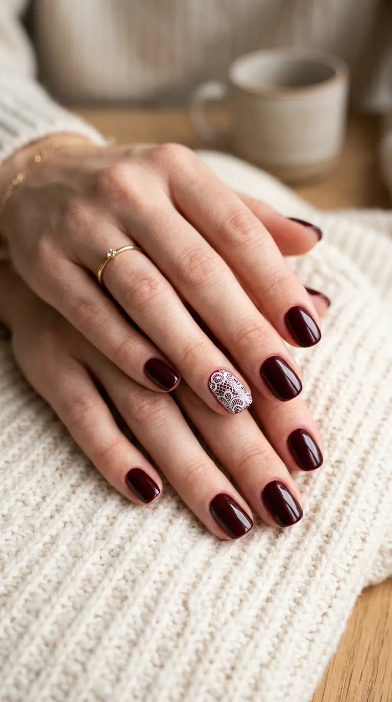 Oxblood nail art with lace