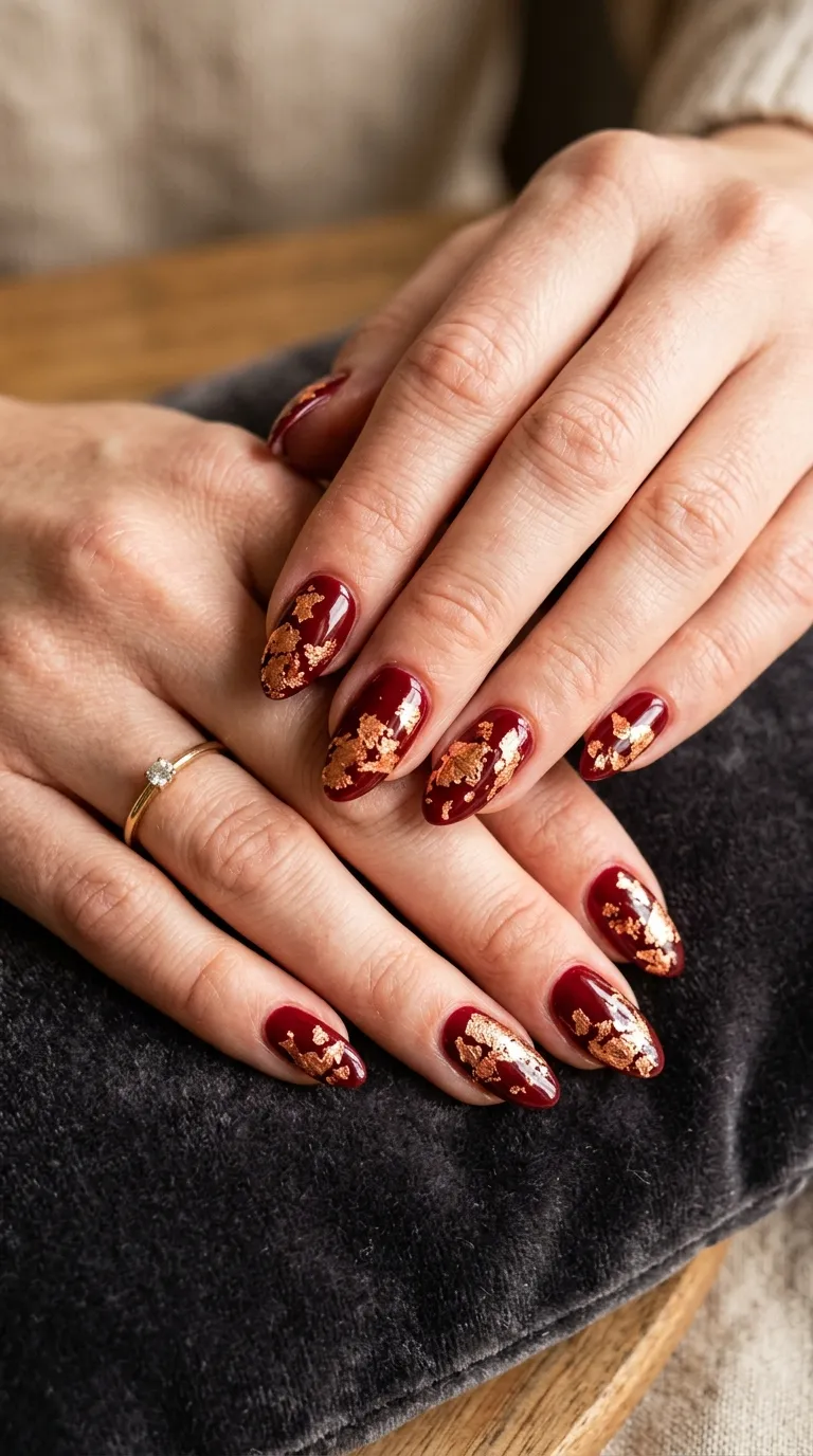 Red nails with copper leaf