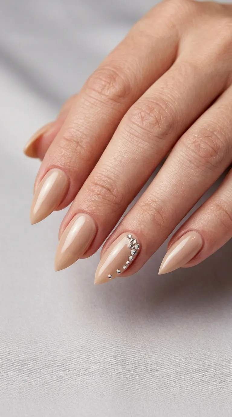 short stiletto nails rhinestone accent design