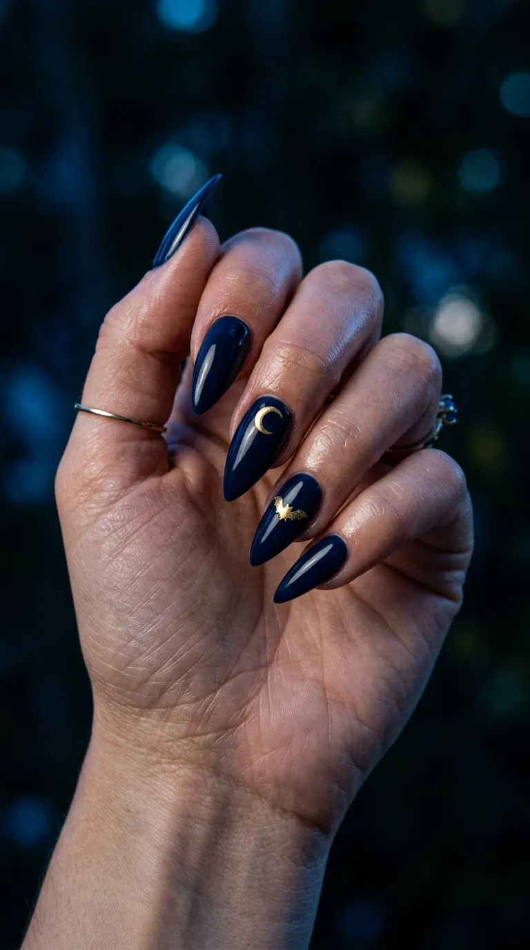 navy black nails with bat silhouette and crescent moon accent