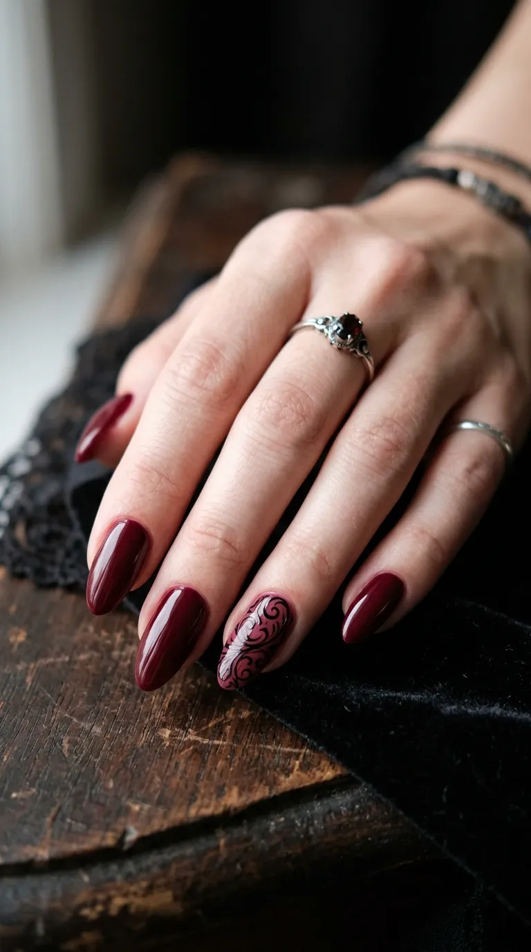 deep wine red vampire nails with black gothic swirl line art