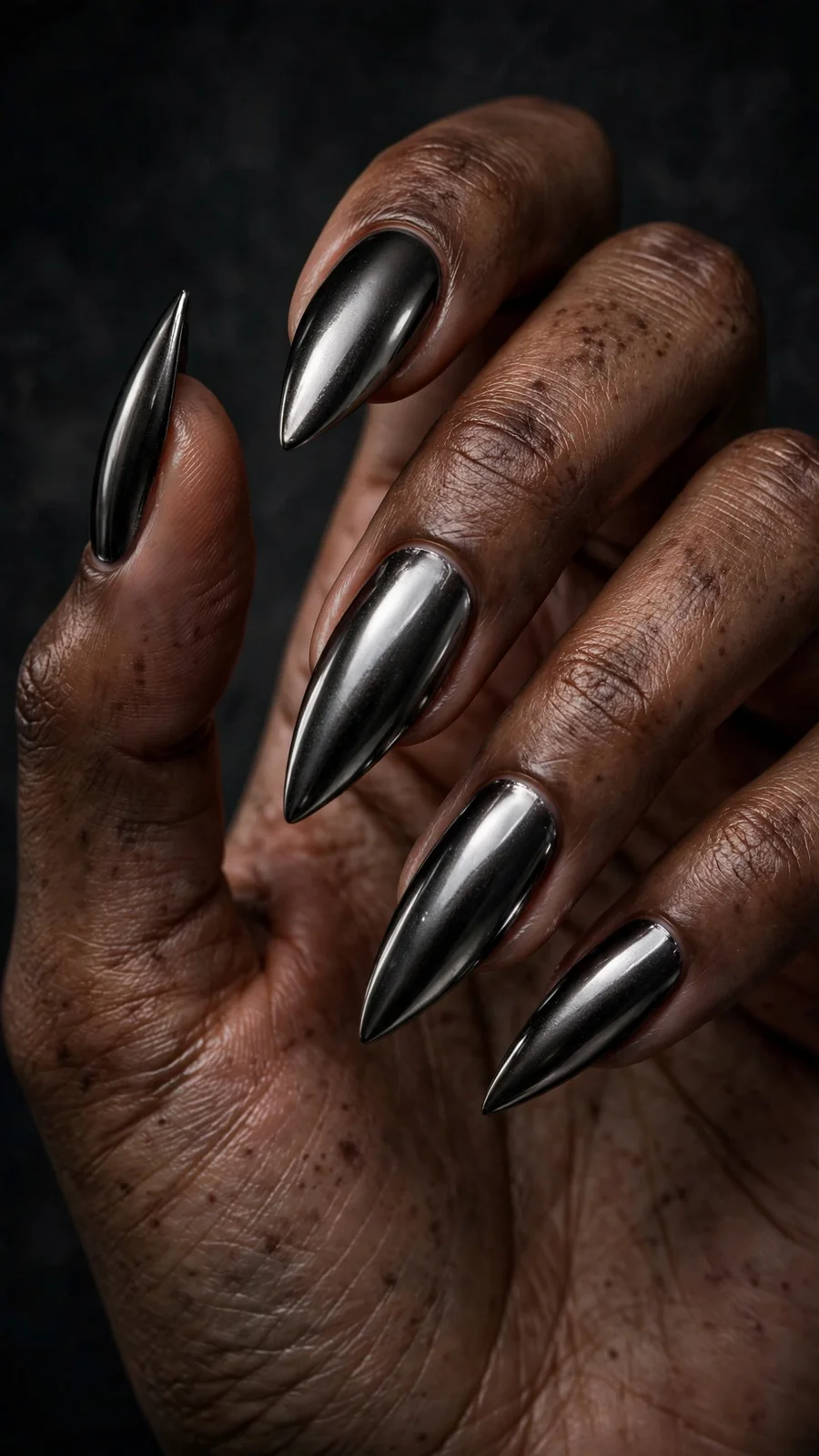 Gunmetal black chrome stiletto nails