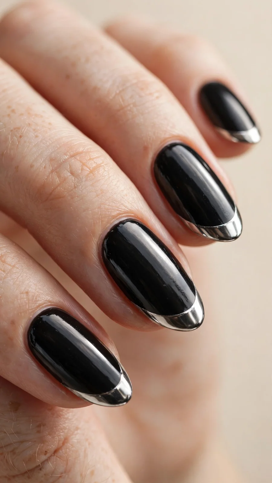 Black nails with silver chrome French tips