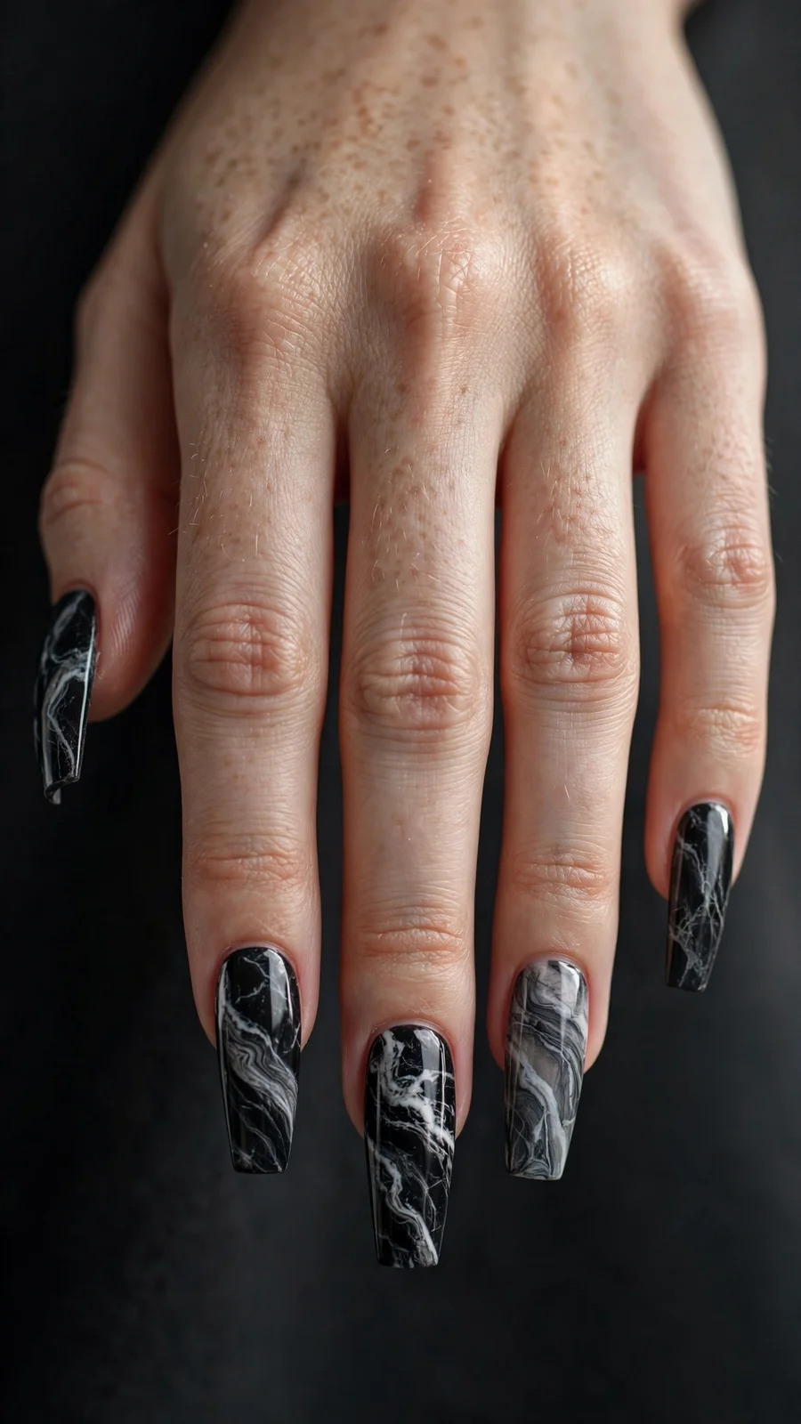 Black marble nails with white veining