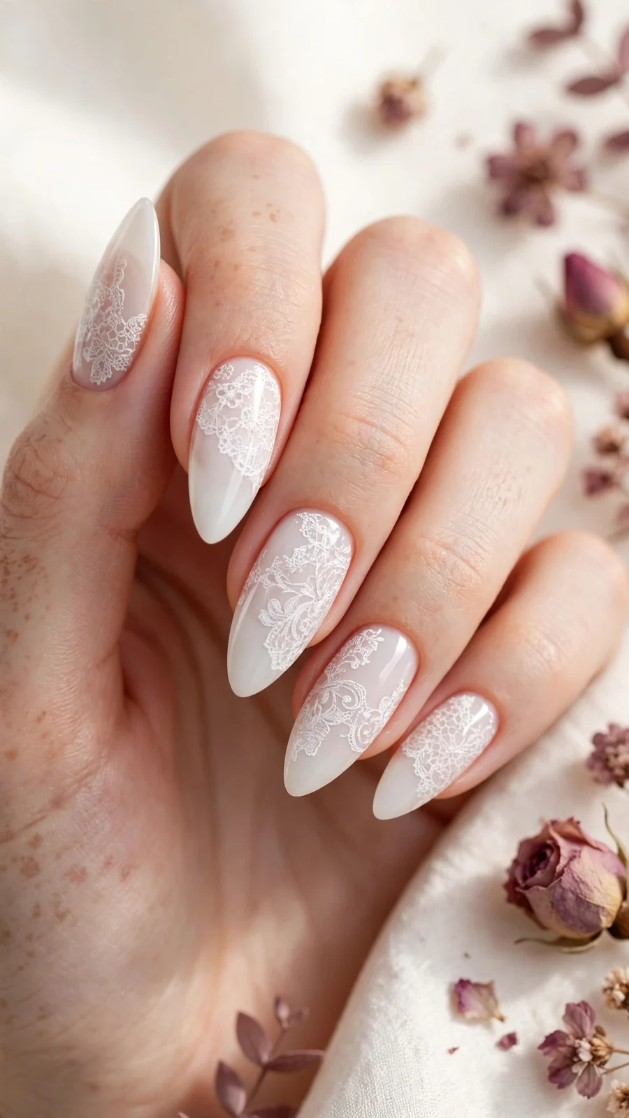 Milky white nails with white lace stamping pattern