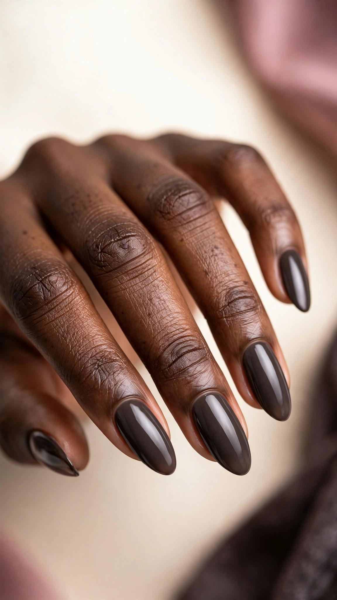 Dark espresso taupe nails, smoky brown-grey, on dark skin hands