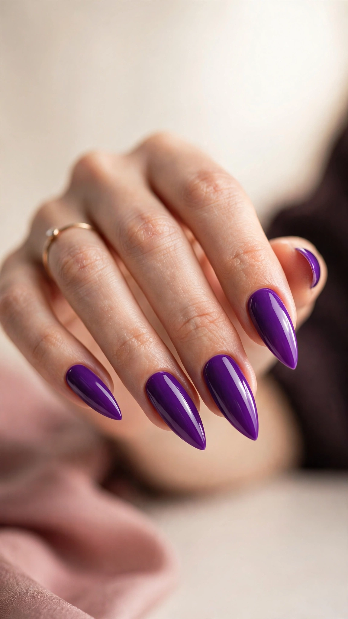 Bold purple stiletto nails