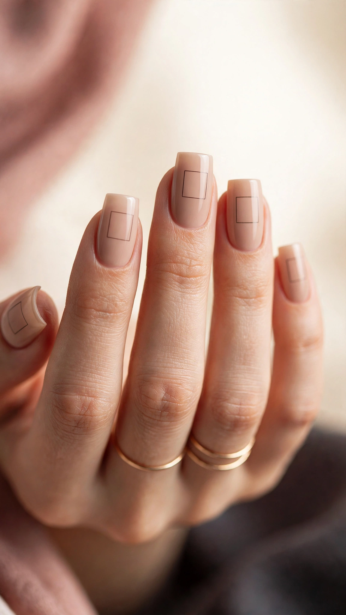 Minimal black line art on nude square nails